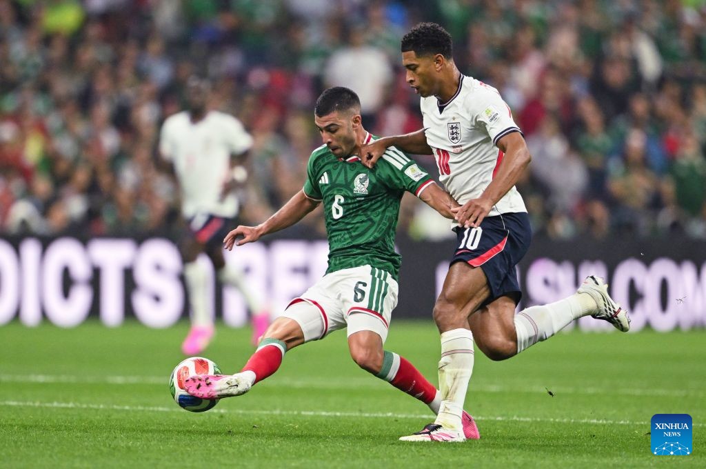 Jude Bellingham ghi 2 bàn trong trận thắng Mexico giúp tuyển Anh vào tứ kết World Cup 2026. Ảnh: Xinhua