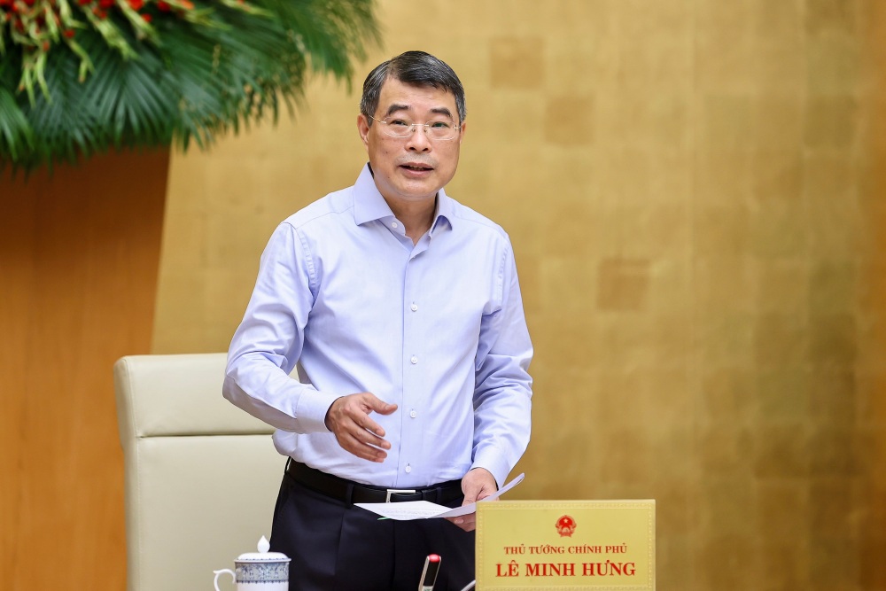 Politburo member, Prime Minister Le Minh Hung emphasized the policy and law of decentralization, delegation of power, allocation of resources, and more conditions, not pushing work and risks to the grassroots level. Photo: VGP