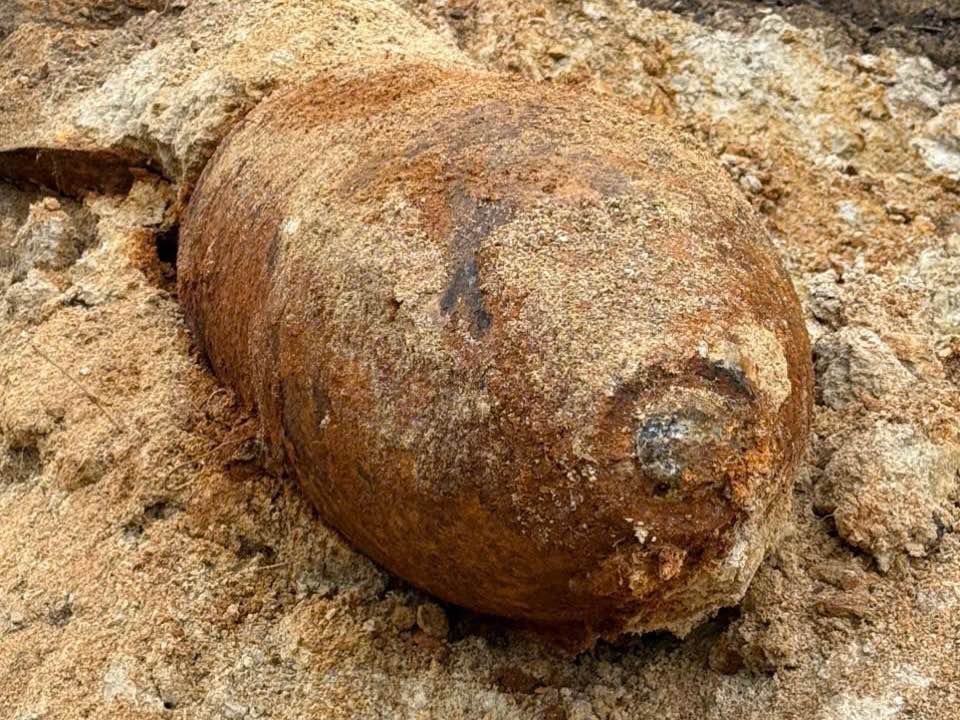 The bomb was discovered during road construction. Photo: Bao Ha Commune People's Committee