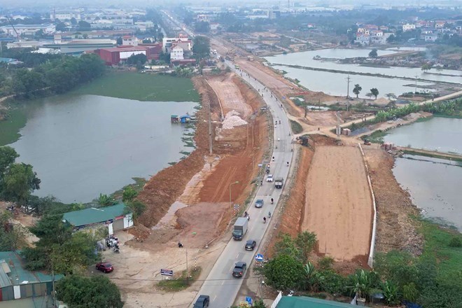 National Highway 6, Hanoi after being expanded will have a cross-section of 50-60 m. Photo: Song Huu