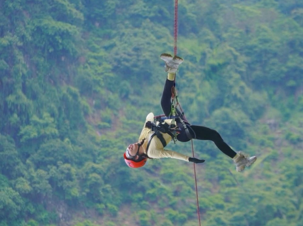 Tourists experience swinging here at Yen Son Heaven Gate. Photo: Ngoc Yen