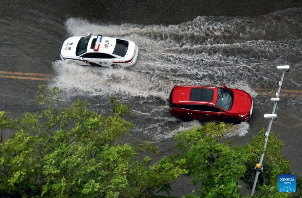 Flooding in Beijing (China) due to the impact of Typhoon Dolphin. Photo: Xinhua