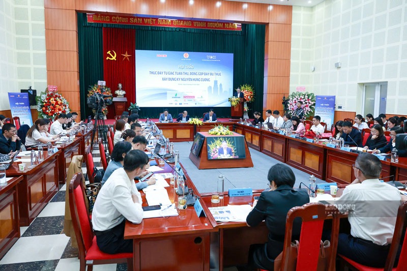 Workshop "Promoting self-discipline in compliance, fully contributing taxes - Building a resilient era" organized by Lao Dong Newspaper in coordination with the Tax Department. Photo: Hai Nguyen