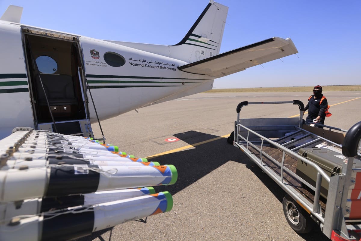 Ground personnel prepare a cloud-sealing aircraft at an airport in Turkistan, southern Kazakhstan. Photo: AFP