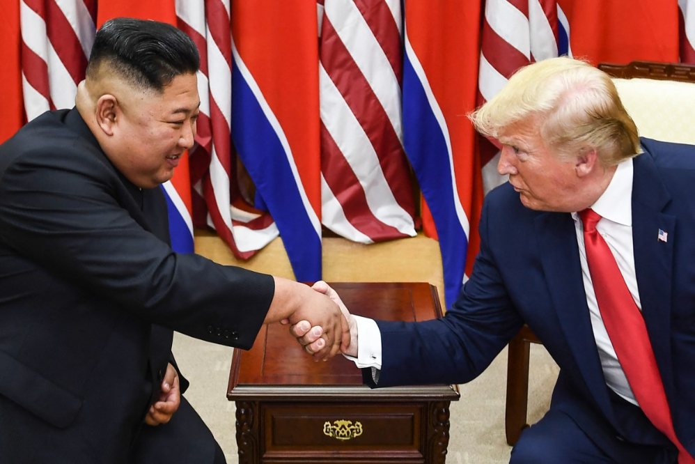 North Korean leader Kim Jong Un (left) and US President Donald Trump during a meeting at the inter-Korean Demilitarized Zone (DMZ) on June 30, 2019. Photo: AFP