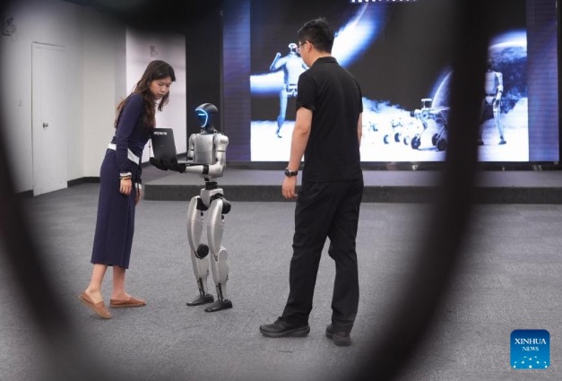 Human-shaped robot of Unitree Company from China. Photo: Xinhua