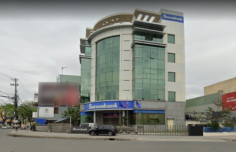 Two orphaned brothers in Da Nang were kept in their home after Sacombank Quang Nam bank wrote off a debt of 1.7 billion VND of their parents. Photo: Hoang Bin