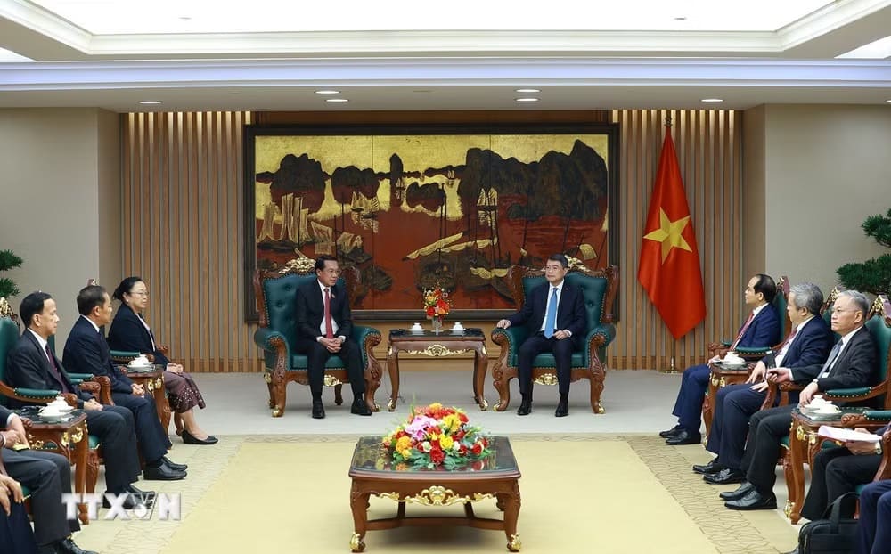 Thủ tướng Chính phủ Lê Minh Hưng tiếp đồng chí Vanhxay Phongsavanh, Chủ nhiệm Ban Kiểm tra Trung ương, Tổng Thanh tra Nhà nước Lào. (Ảnh: Dương Giang/TTXVN)