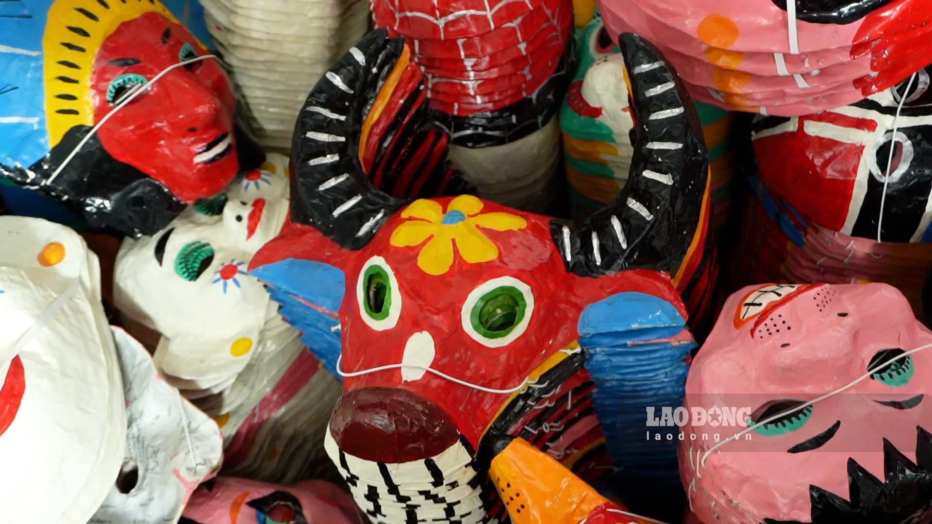 Colorful paper masks are being prepared for the Mid-Autumn Festival. Photo: Huyen Anh
