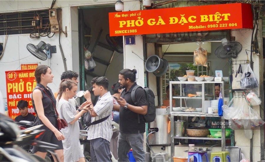 A bowl of pho becomes a starting point for international tourists to explore Hanoi culture and cuisine. Photo: Minh Vu