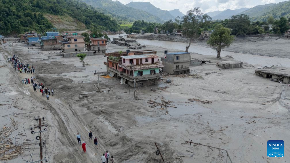 Houses are flooded with mud after a flash flood in Nuwakot, Nepal. Photo: Xinhua