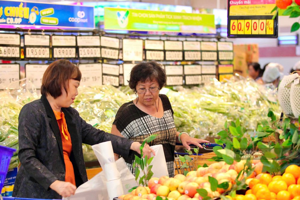 Shelves are filled with food and essential consumer goods to serve people shopping during the holidays. Photo: Thai Bao