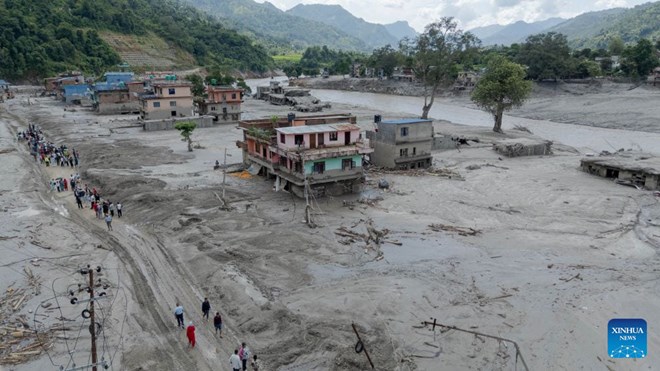Houses flooded in mud after the flash flood in Nuwakot, Nepal. Photo: Xinhua