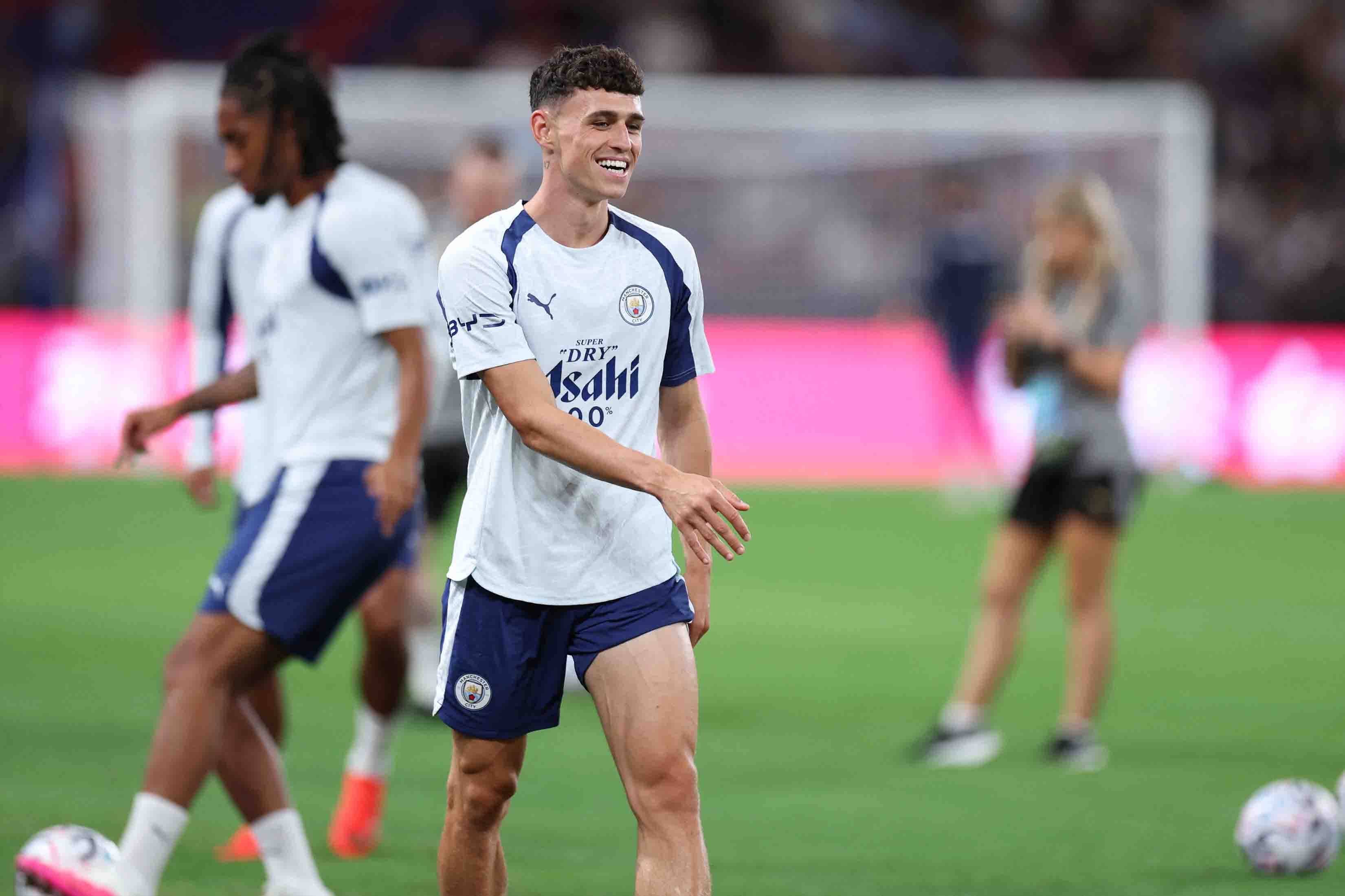 Phil Foden in the latest training session with Man City in China. Photo: AFP