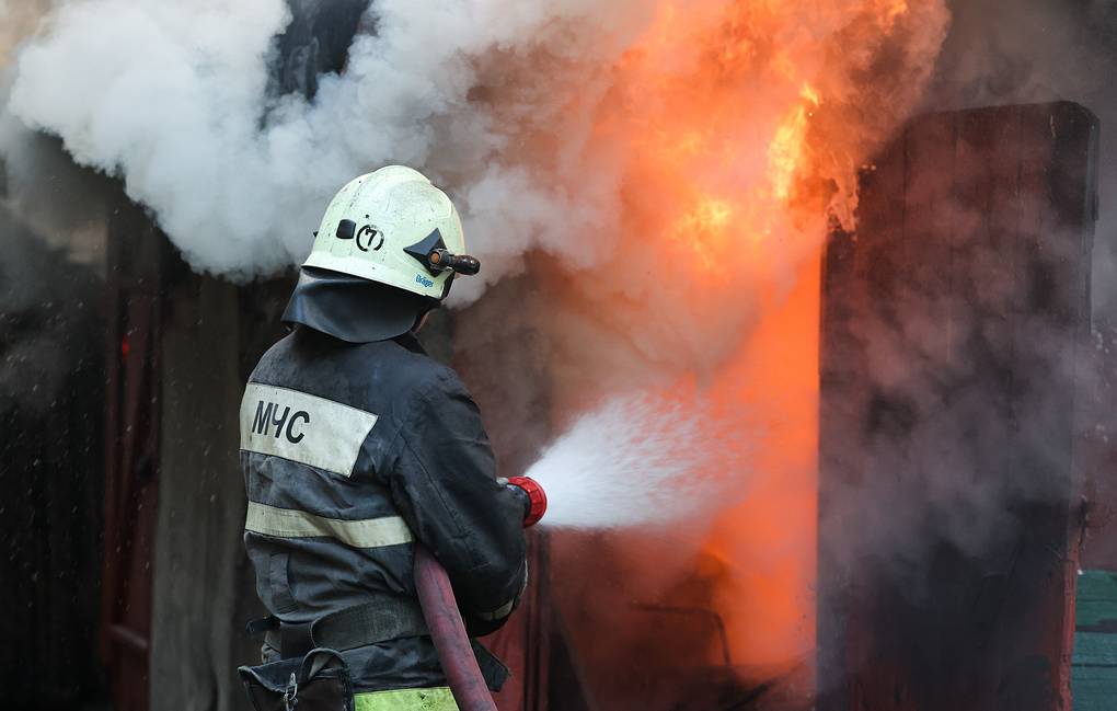 Russian rescue forces deploy firefighting at the scene after UAV attacks. Photo: TASS
