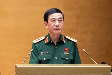 General Phan Van Giang, Member of the Politburo, Deputy Prime Minister, Minister of National Defense presents the Submission on the morning of August 4. Photo: Media of the National Assembly
