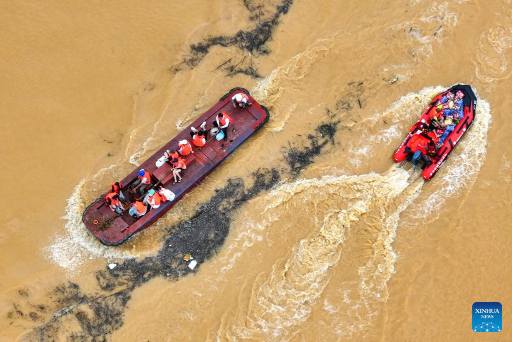 Rescue forces evacuate people trapped by storms and floods in Guijiang city, China, July 8, 2026. Photo: Xinhua