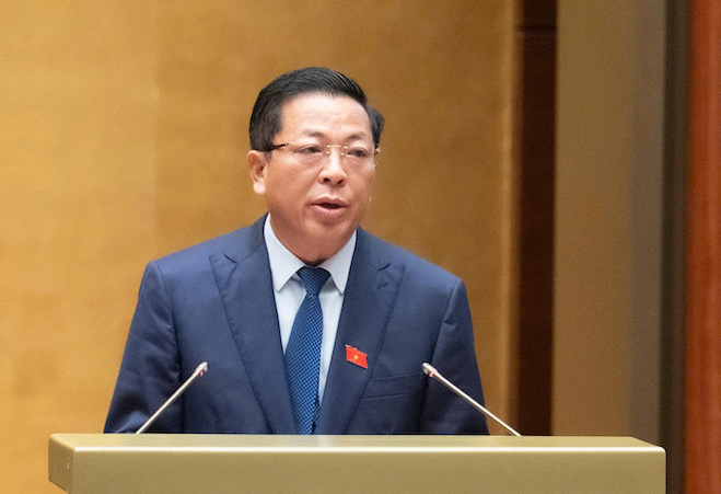 On behalf of the Government, Member of the Party Central Committee, Minister of Construction Tran Hong Minh presented to the National Assembly the investment policy for the Ring Road 5 - Hanoi Capital Region investment project. Photo: Media National Assembly