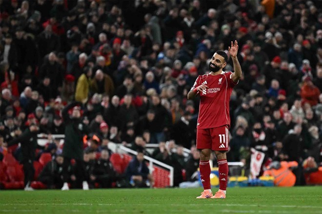 Salah rời Liverpool với tư cách của một huyền thoại. Ảnh: AFP