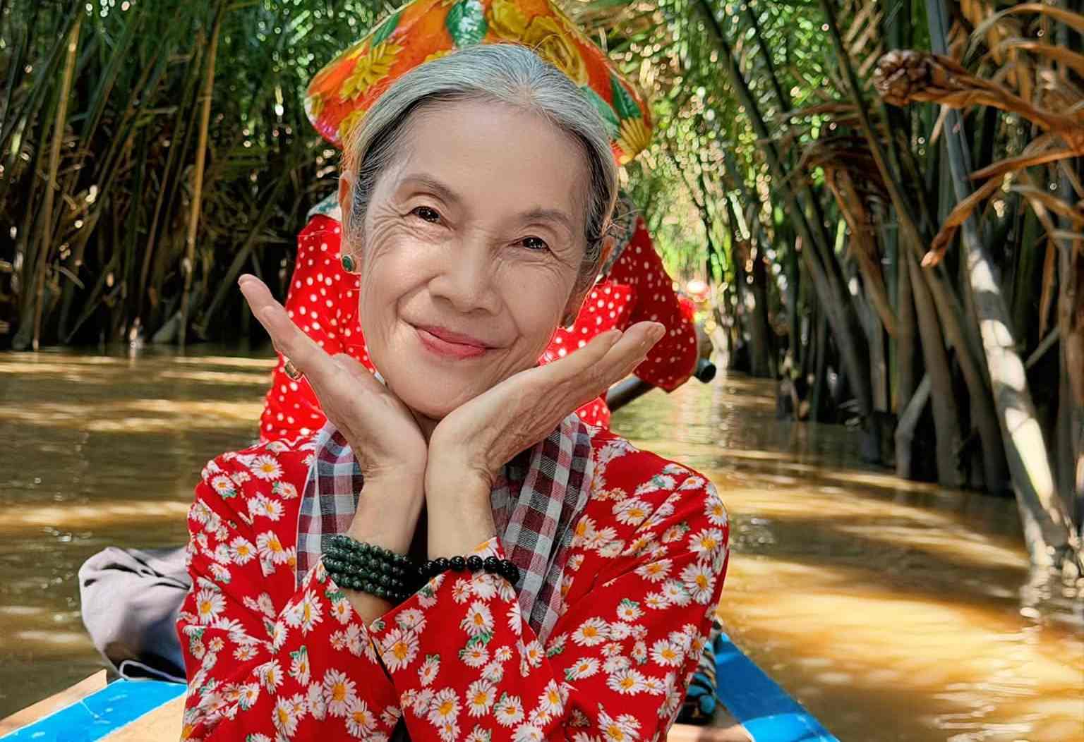 Artist Thanh Hien experiences eating water coconuts and traveling by boat. Photo: Artist provided.