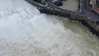 Close-up of Hoa Binh Hydropower Plant continuing to discharge floodwater. Photo: Minh Nguyen