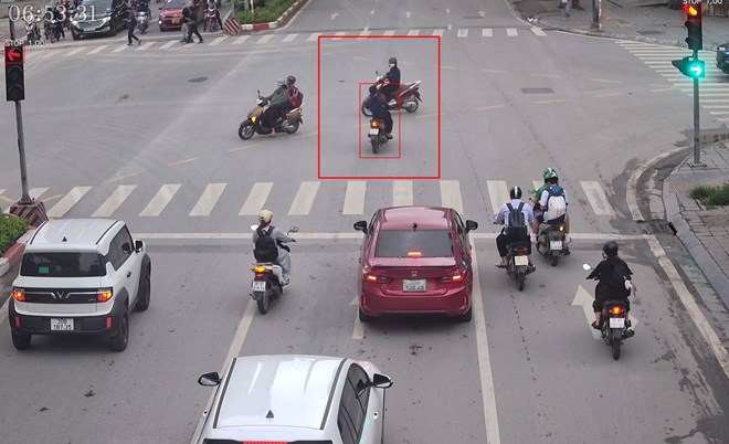 Cases of motorbikes running red lights recorded by AI cameras. Photo: Traffic Police Department