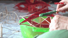 Ms. Thanh's family preserves the traditional Mid-Autumn lantern making craft.