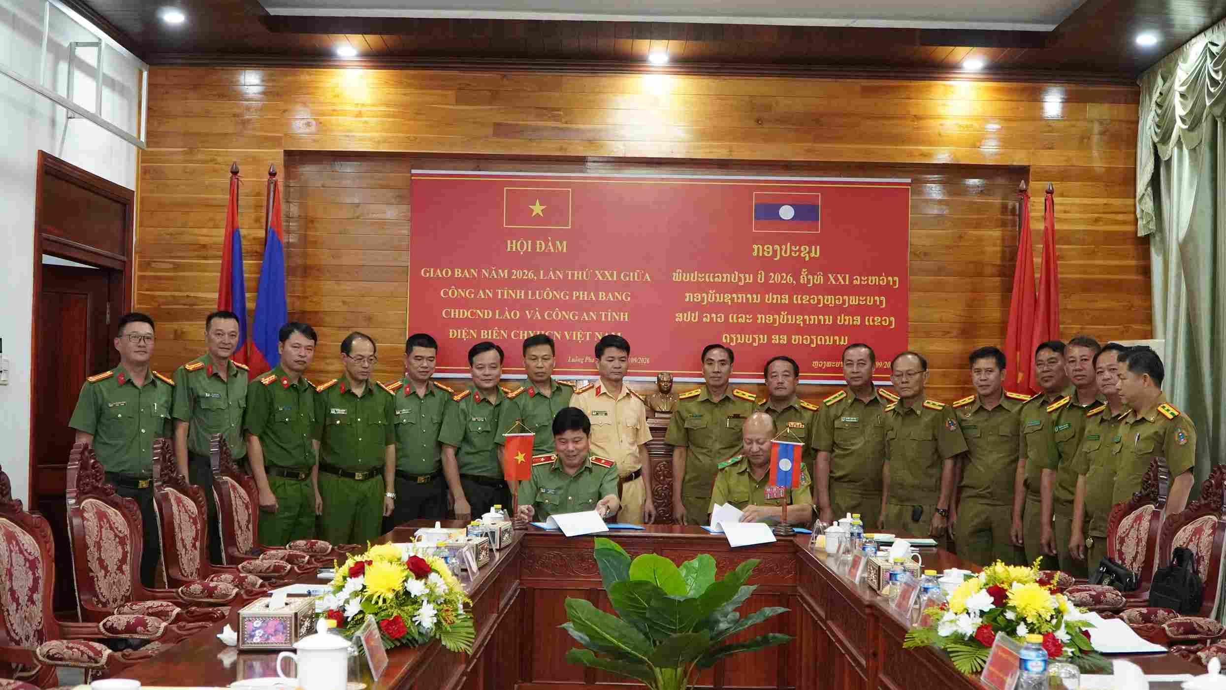 The two sides signed a memorandum of understanding at the annual talks. Photo: Dien Bien Police.