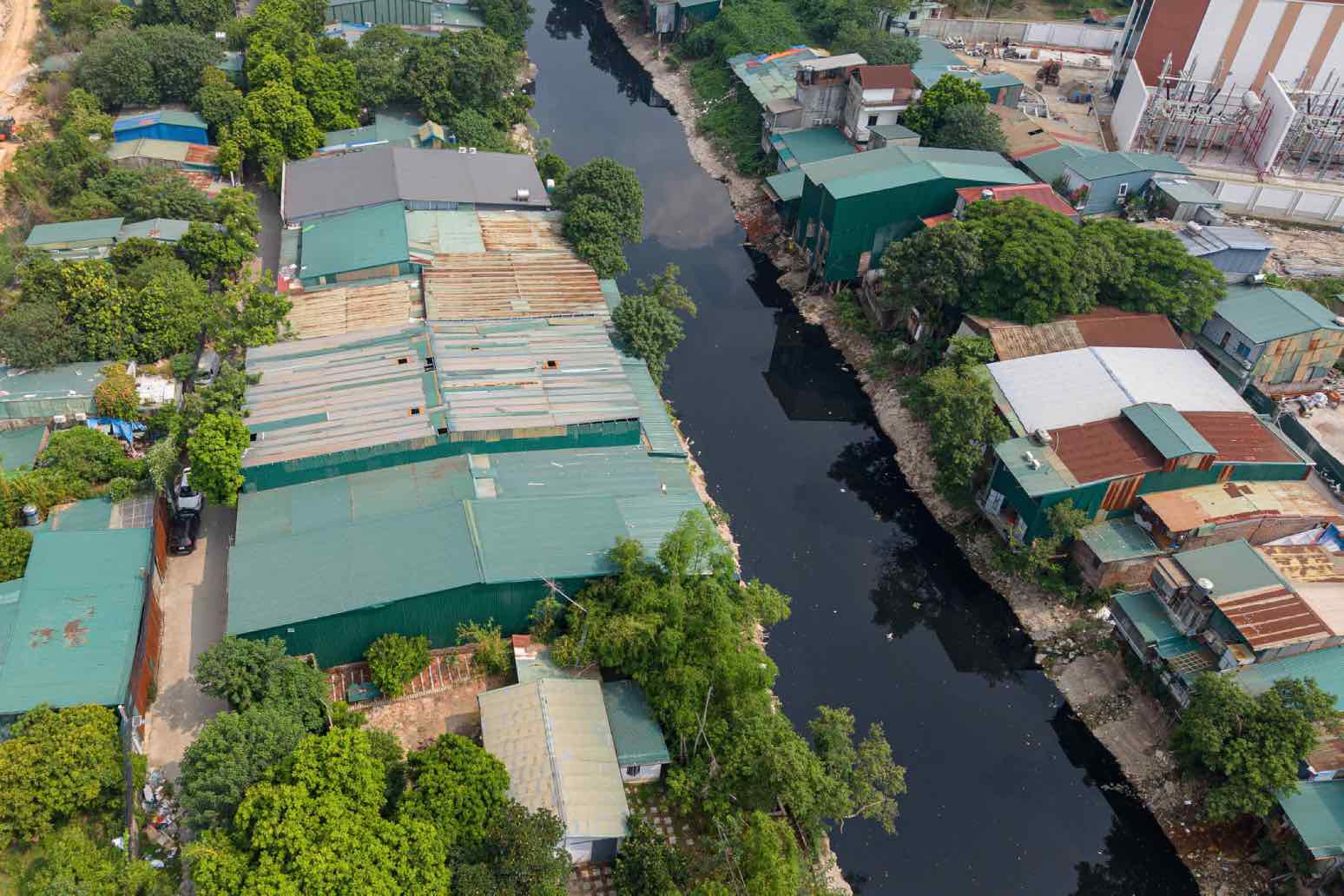 Factory built close to the banks of the Nhue River. Photo: Hoang Bang/VNA