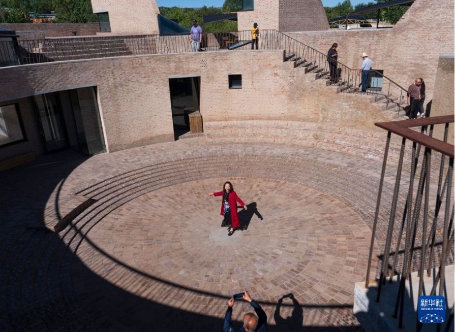 Tourists experience the vast art space built from old bricks of Tay O To Do village in Hohhot city, Inner Mongolia, September 10, 2026. Photo: Xinhua