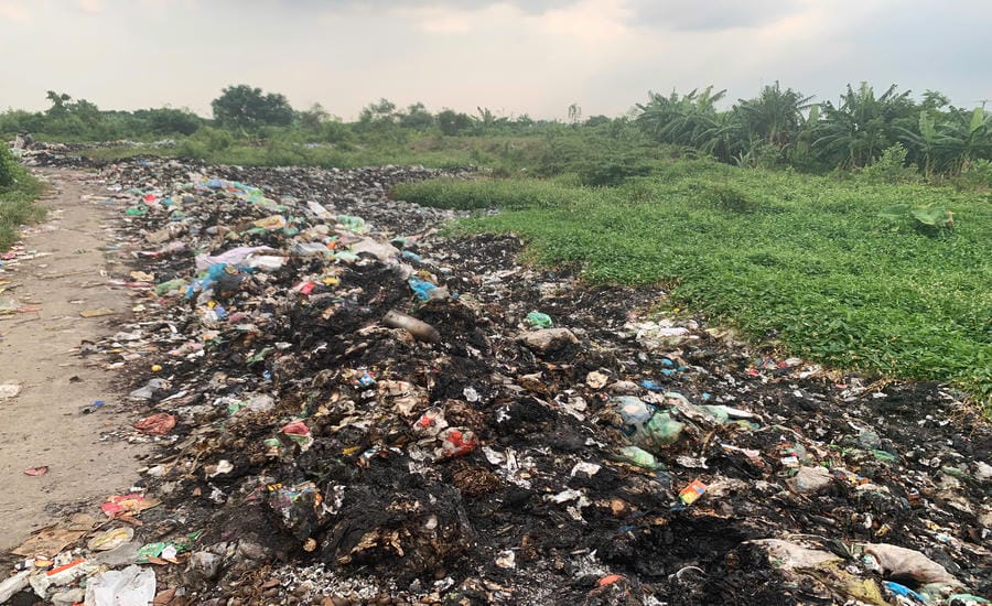 Black burnt trash piled up in a mess. Photo: Luong Ha (taken in September 2026)