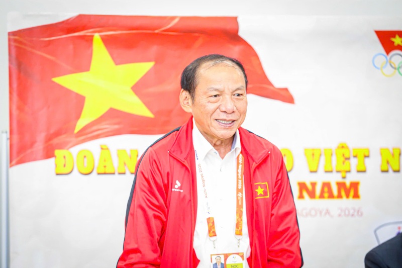 Chủ tịch Ủy ban Olympic Nguyễn Văn Hùng động viên Đoàn thể thao Việt Nam. Ảnh: Bùi Lượng