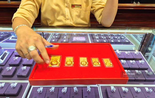 Le prix des lingots d'or SJC dans la plupart des marques aujourd'hui est coté entre 144,6 et 147,6 millions de VND/tael (achat - vente). Photo: Phan Anh.