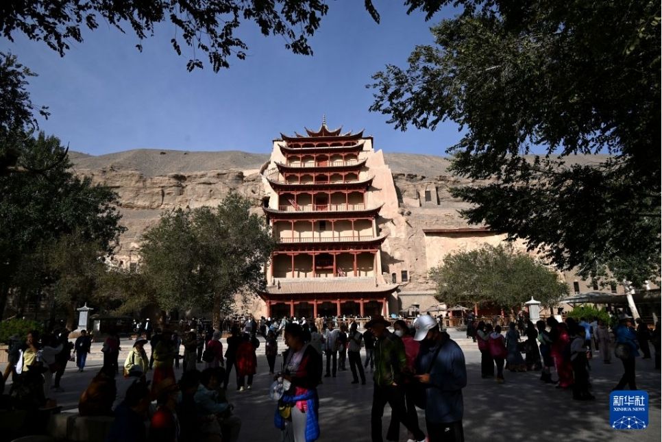 Quần thể hang động Mạc Cao mang vẻ đẹp cổ kính, đậm văn hoá Trung Quốc. Ảnh: Xinhua phát ngày 20.9