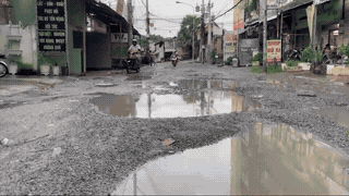 People are haunted by pothole roads, mud and stench in Ho Chi Minh City
