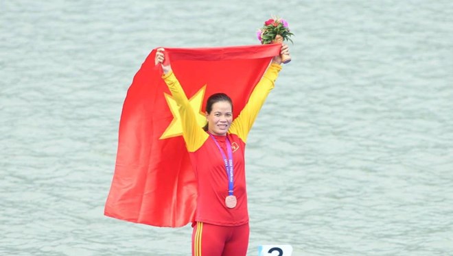 Athlete Pham Thi Hue participates in ASIAD for the 5th time with Vietnamese sports. Photo: Bui Luong