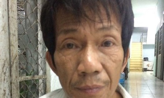 Ông Nguyễn Văn Nam, sau khi chém chết con rể và chở tới trụ sở công an đầu thú.