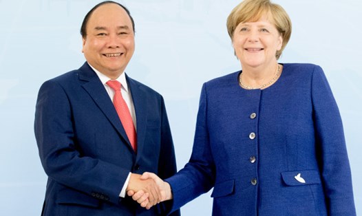 Thủ tướng Chính phủ Nguyễn Xuân Phúc và Thủ tướng Đức Angela Merkel. Ảnh: AFP