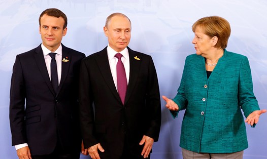 Ông Vladimir Putin, Emmanuel Macron và bà Angela Merkel. Ảnh: Sputnik