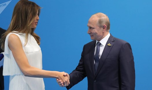 Đệ nhất phu nhân Mỹ Melania Trump và Tổng thống Nga Vladimir Putin. Ảnh: Sputnik