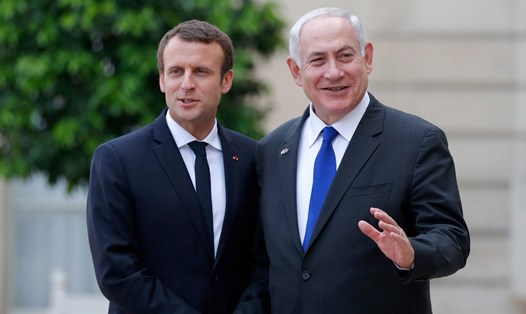 Thủ tướng Benjamin Netanyahu và Tổng thống Pháp Emmanuel Macron sau cuộc gặp tại Paris ngày 16.7. Ảnh: Reuters