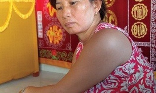 Chị Đỗ Thị Hòa (vợ thợ lặn Formosa xấu số Lê Văn Ngày) nói: “Chồng tôi không thể chết vì suy tim cấp”. Ảnh: Nhiệt Băng