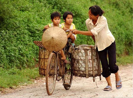 Nụ cười xen lẫn nước mắt của mẹ.